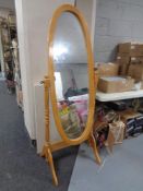 A contemporary cheval mirror