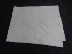 A cream Durham quilt