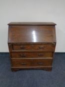 An early 20th century oak bureau