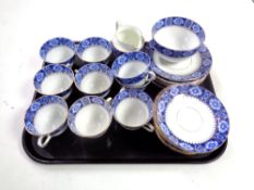 A tray containing 31 pieces of Richmond blue and gilt tea china.
