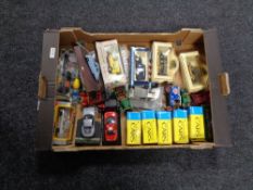A box containing boxed and unboxed die cast vehicles, Ringtons vans, Burago, Solido etc.
