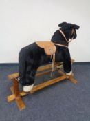 A Mamas and Papas rocking horse