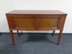 A mahogany bow-fronted washstand