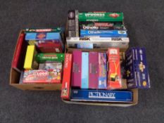 Three boxes containing a quantity of contemporary board games, some sealed in retail packaging.