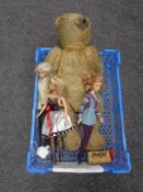 A crate containing vintage jointed mohair teddy bear, dolls, Matchbox die cast Porsche 910 in box.