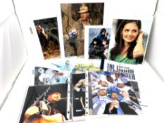 A collection of signed photographs and ephemera to include - Strangeness in Space, Raintown,