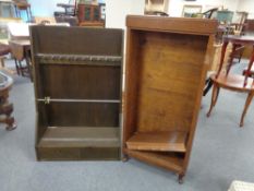 A set of continental oak open bookshelves together with a floor standing rack fitted two drawers