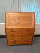 A contemporary pine writing bureau,
