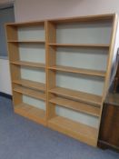 A pair of open bookshelves