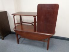 A mahogany flap sided table