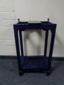 A painted stick stand