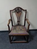 A 19th century Hepplewhite style armchair with a tapestry upholstered seat