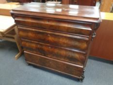 A 19th century continental mahogany four drawer chest