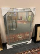 An all glass mirror 74 x 105 cm