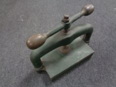 A 19th century cast iron book press