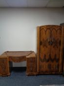 A 1930s walnut double door gentleman's wardrobe with matching dressing table (no mirror)
