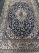 A Nain rug, central Iran, 310cm by 196cm CONDITION REPORT: Some moth damage.