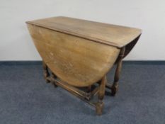 A Priory Oak gate leg table