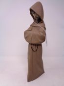 A Lladro figure of a monk in a matte finish
