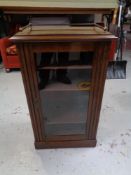 An Edwardian mahogany music cabinet