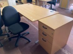 A beech effect desk, width 160 cm, together with three drawer chest and black swivel chair.