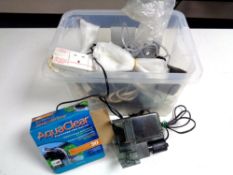 A box containing fish tank accessories to include pump,