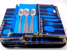 A tray of a quantity of boxed Viner's stainless steel and Chelsea steel table cutlery