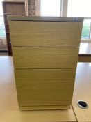 Two two-drawer oak effect chests, width 42 cm.