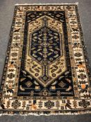 An antique Malayer rug 193 cm x 122 cm