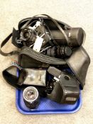 A Canon AE-1 35mm SLR camera with FD 24mm 1:2:8 lens,