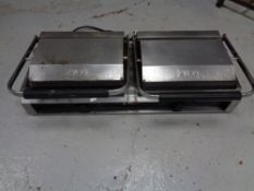 A Zyco commercial stainless steel double panini press