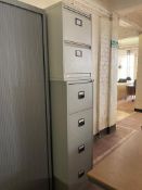 A metal four drawer filing chest with key together with two drawer metal filing chest.