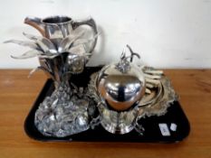 A tray containing antique and later plated wares to include a base in the form of a palm tree, jug,