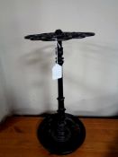 A 19th century circular cast iron stick stand