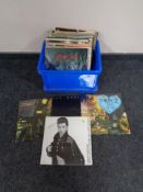 A box of vinyl LP's and 12