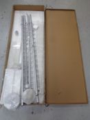 A boxed Break the Ice shop clothes rail