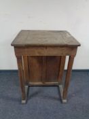 An early 20th century oak clerk's desk