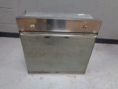 A Smeg stainless steel electric integrated cooker