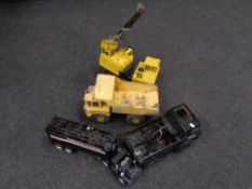 Three 20th century Tonker tin plate vehicles together with a plastic and metal truck with trailer