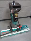 A Bosch 1600 HP garden chipper shredder together with a boxed Bosch AHS52ACCU electric hedge