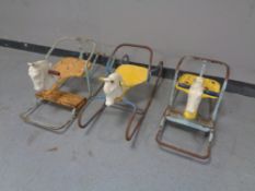 A mid 20th century toddler's Tri-ang rocking horse together with two other similar