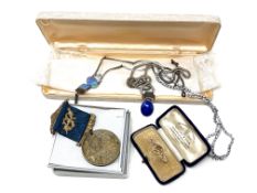 A 9ct gold and sapphire brooch, a silver opalescent necklace,