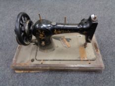 An early 20th century Jones hand sewing machine