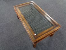 A William Sheppee Indian Collection Jali glass topped coffee table