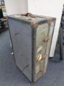 An early 20th century metal bound shipping trunk