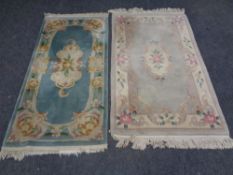 Two fringed Chinese rugs