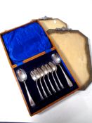 Two Edwardian octagonal picture frames together with a set of cased dessert spoons