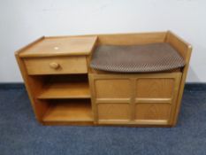 A 20th century teak telephone table