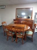 A nine piece Barker and Stonehouse dining room suite comprising of triple door sideboard fitted