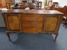 An Edwardian mahogany sideboard